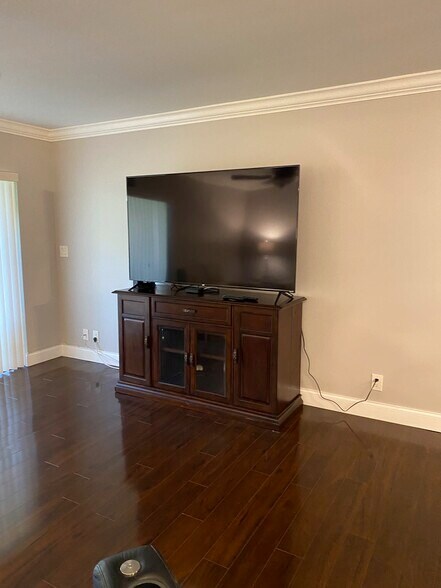 60 inch Smart TV in Living room - 123 Deer Creek Blvd