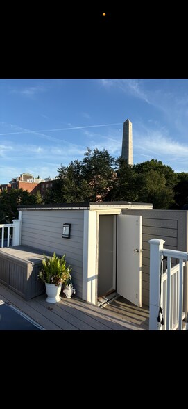 Units private roof deck overlooking the monument - 18 Concord St