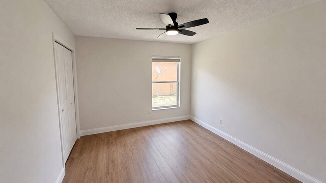 Building Photo - "Stunning 4-Bedroom Lake View Home in Oviedo – Spacious 2,132 Sq Ft Retreat!"