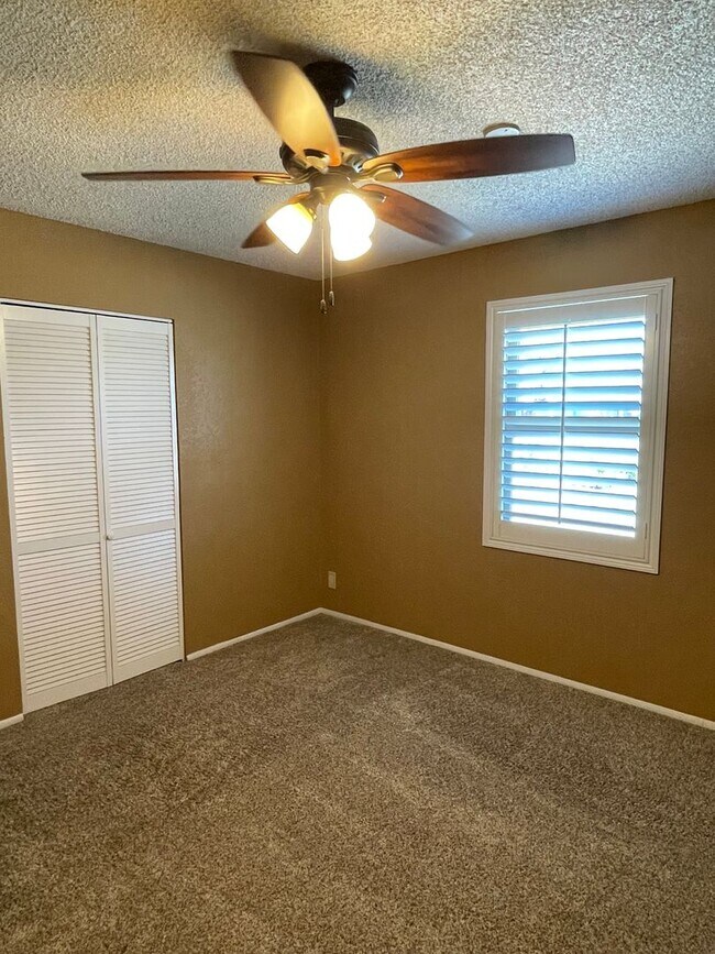 Building Photo - OWNER'S SUMMER SPECIAL-$300 OFF first 3 months! Sparkling Pool Home!