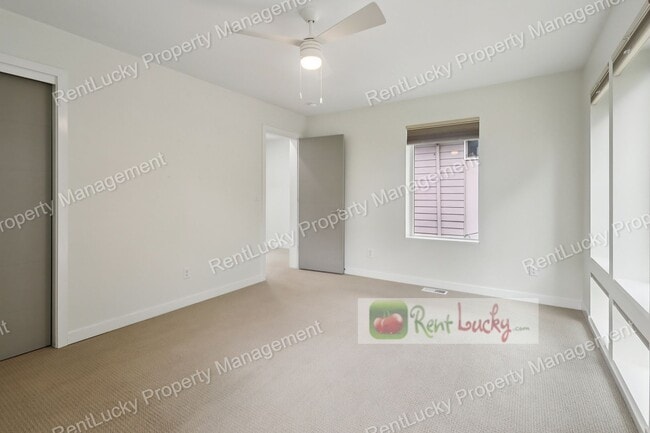 Building Photo - Immaculate and LARGE 4-Bedroom Home in Unb...