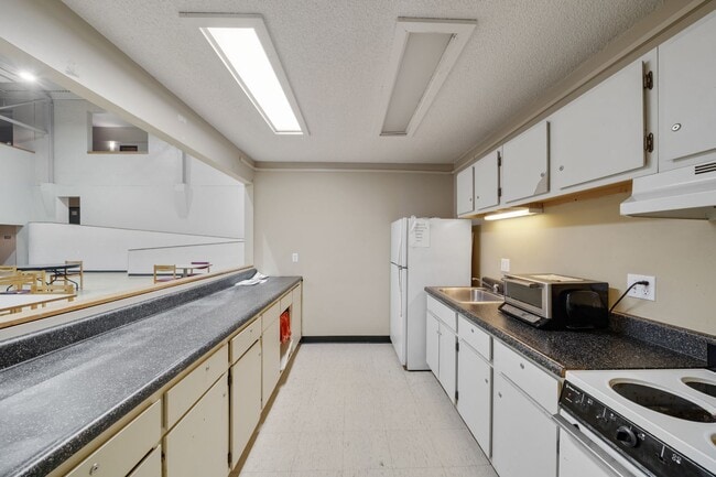 Building Photo - Come live in a 55+ community in an old sch...