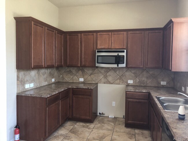 Building Photo - A Must See! Roomy 4 Bedroom 2 1/2 Bath in ...