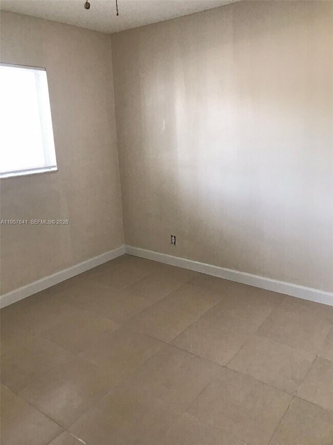 Building Photo - 8550 N Sherman Cir