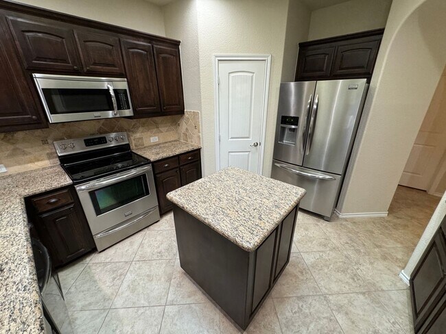 Building Photo - Argyle ISD Gem with Huge Private Backyard & Open Floorplan
