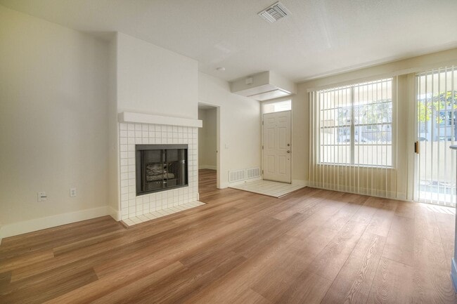 Building Photo - Coastal Living at Its Best – Upgraded 1BR Condo with Private Patio & Resort-Style Amenities