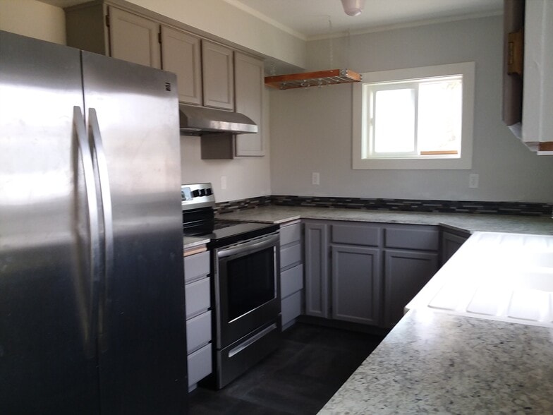 Kitchen with Stainless Steel Appliances - 215 N Emmett Ave