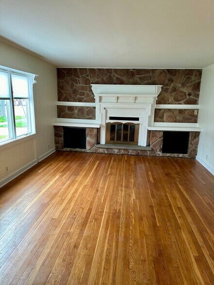 Living room with fireplace (Decorative) - 625 Roosevelt Ave