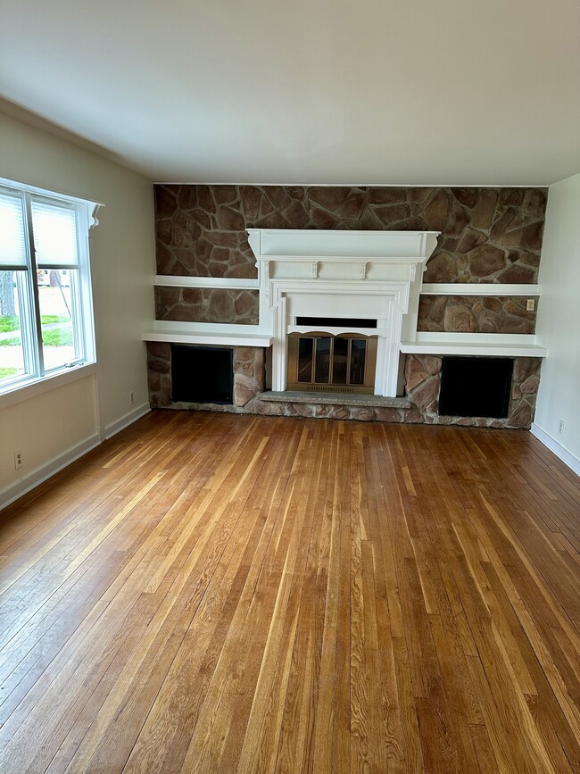 Living room with fireplace (Decorative) - 625 Roosevelt Ave