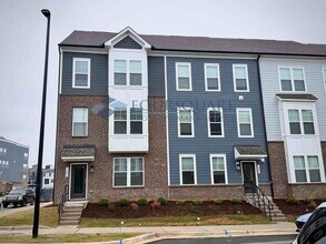 Building Photo - Bright End-Unit 3-Bed / 2.5-Bath Townhome with Flex Space, Gourmet Kitchen & 2-Car Garage – Walka...