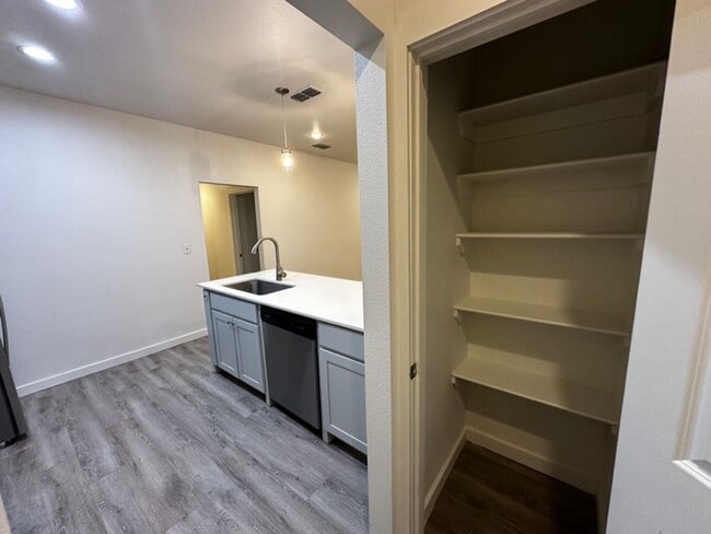 Building Photo - Three Bed, Three Bath now Available!