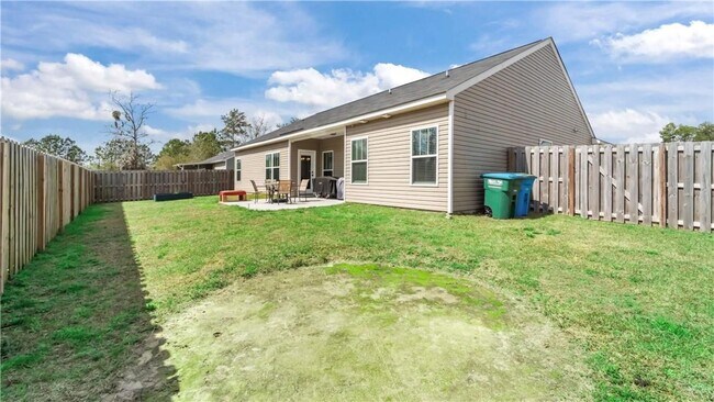 Building Photo - Relax & Unwind at this 4-Bedroom Home with Scenic Lagoon Views in Rincon