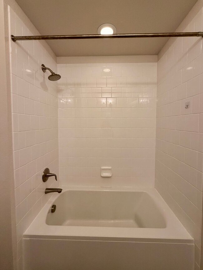 Building Photo - Move-In Ready 3-Story Townhome with Loft & 2-Car Garage