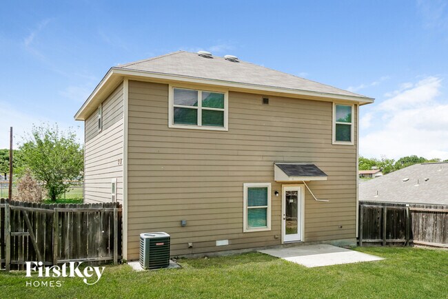 Building Photo - 6630 Woodstock Dr