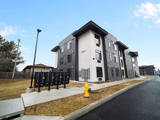 Building Photo - Flats on 4th Apartments