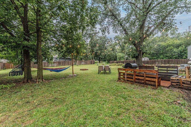 Building Photo - Back porch with a large yard!