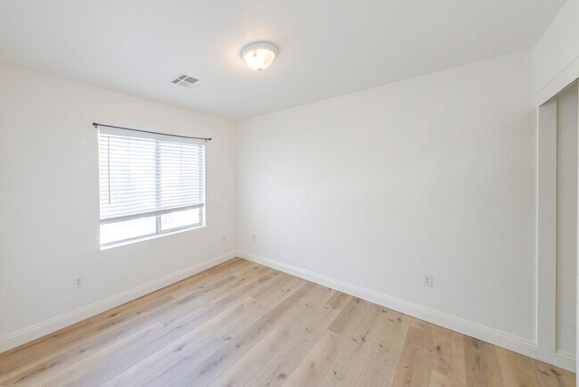 Building Photo - 8146 Golden Flowers St