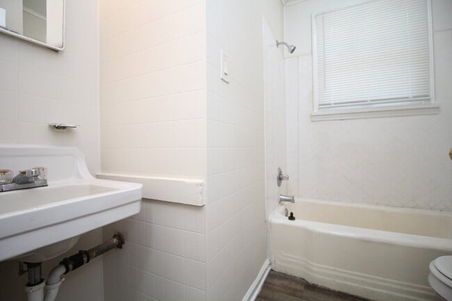 Building Photo - 2BR Cottage Home with LVP Flooring Throughout, Bonus Sunroom, Covered Parking & Low-Maintenance L...