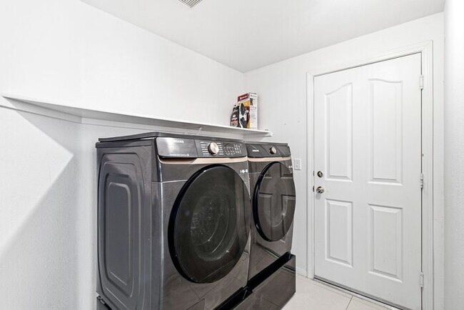 Building Photo - Spacious 4-Bedroom Home with Fireplace, 3-Car Garage & Great Backyard