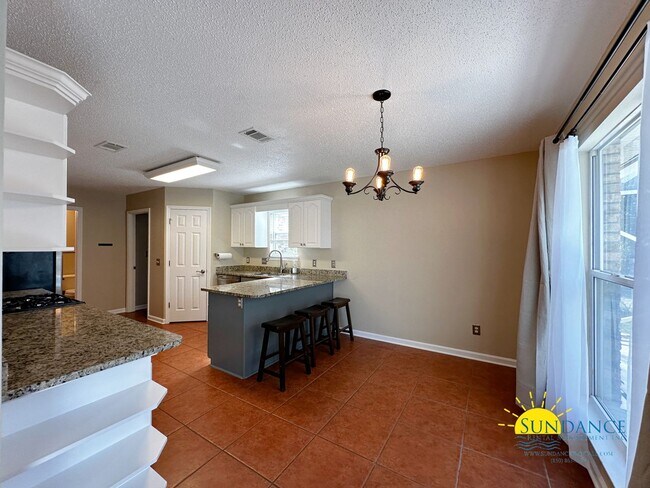 Building Photo - Lakefront home with Enclosed pool centered between Eglin and Hurlburt