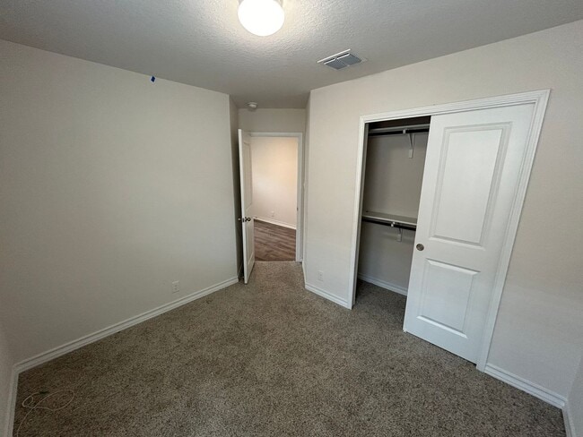 Building Photo - *COMING SOON* 3-Bedroom with Solar Panels & Resort Amenities – Pool, Gym!