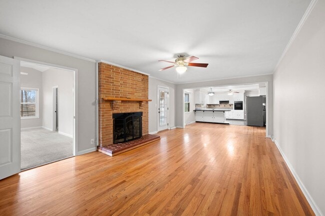 Building Photo - Spacious 4BR (or 3BR + Bonus) with 2 Living Rooms, Screened Porch & 4-Car Garage