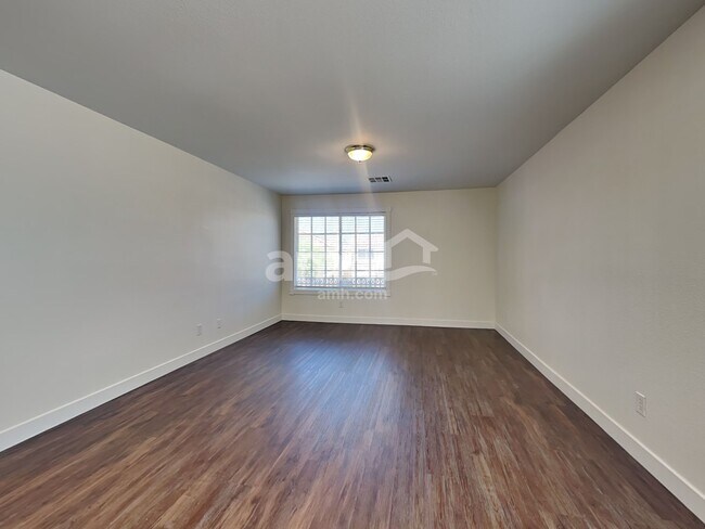 Building Photo - 10749 Artesia Wells St