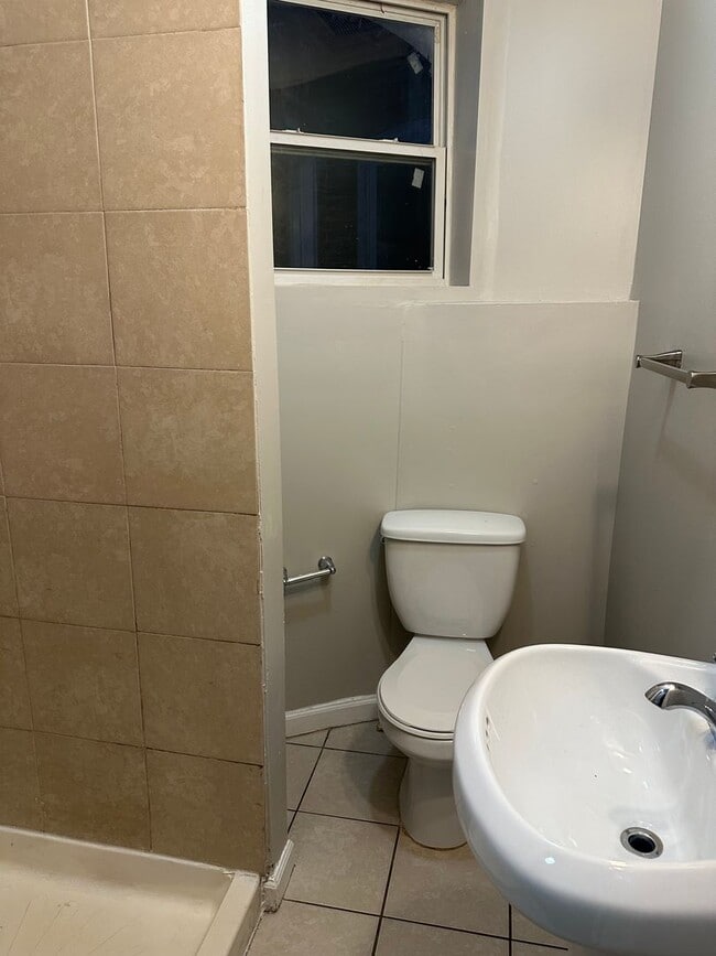 Building Photo - Spacious, Newly Renovated Home! Central Air! Finished Basement! W/D! Double Level Rear Deck! Avai...