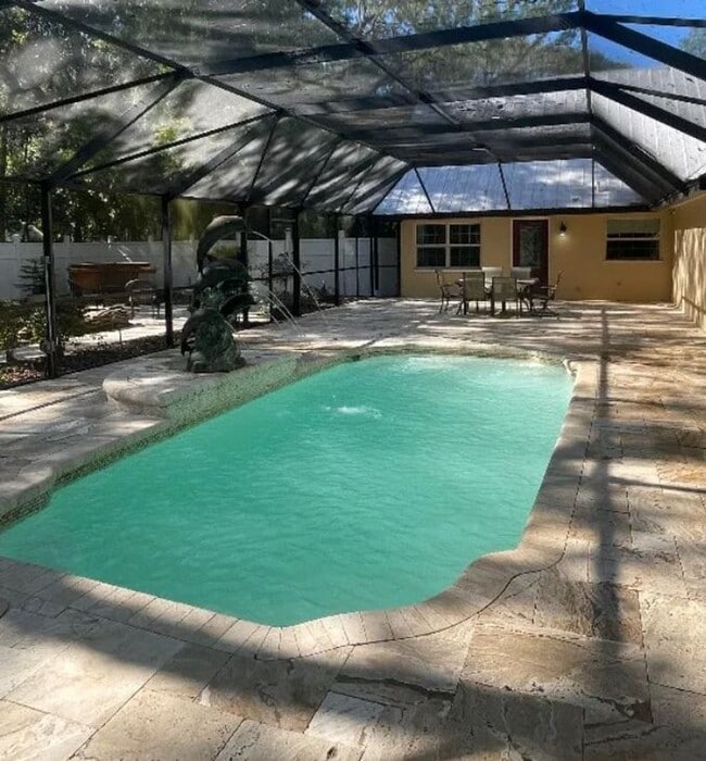 Building Photo - Welcome to this private retreat offering the perfect blend of luxury space and outdoor living.