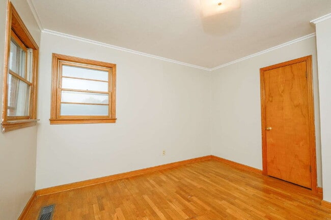 Building Photo - "Charming 3-Bedroom Greenfield Home with Gleaming Hardwood Floors – 1256 Sq Ft of Cozy Comfort!"