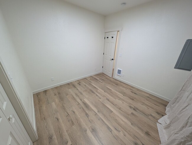 Building Photo - Adorable Four Bedroom w/ Fenced Yard Avail...
