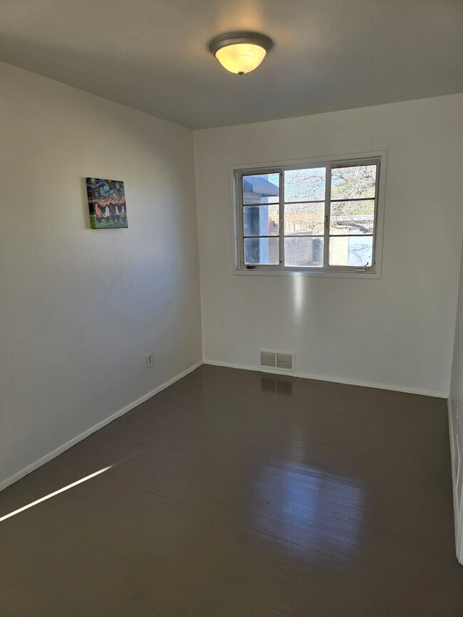 Building Photo - Centrally located in the NE Heights 4 bedroom, 1 3/4 Bath 1900 square feet.