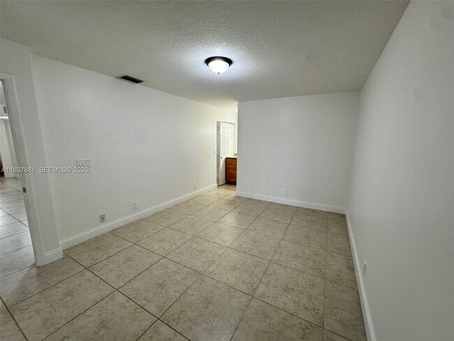 Building Photo - 3817 Cocoplum Cir