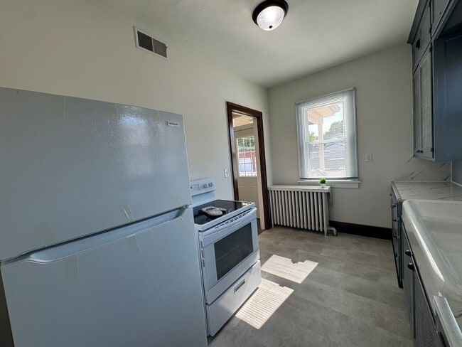 Building Photo - Old Charm, New Shine — Spacious 4 Bed Home...