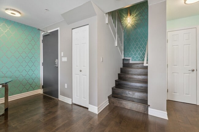 Building Photo - Modern 2-Bedroom Condo with Premium Amenit...