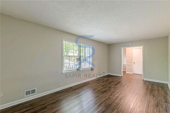 Building Photo - Move in before December 15th and choose your reward: a $250 Amazon Gift Card or a 55" Smart TV!