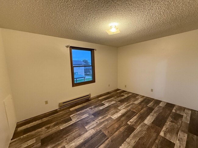 Building Photo - Two bedroom, one and bathroom townhome loc...
