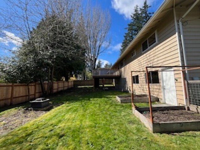 Building Photo - Gorgeous 4-Bd House | Huge Deck, Huge Fenced Yard, & Bonus Room!