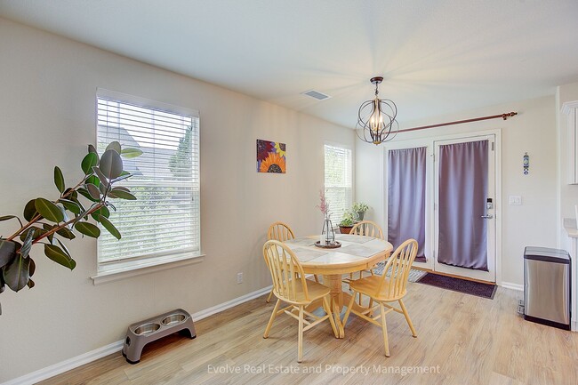 Building Photo - Evolve Real Estate: Beautiful Corner Townhome Available for Move-in on July 21st!