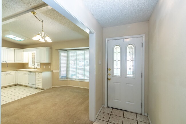Building Photo - 2 Large Living areas! Approximately 2100 S...