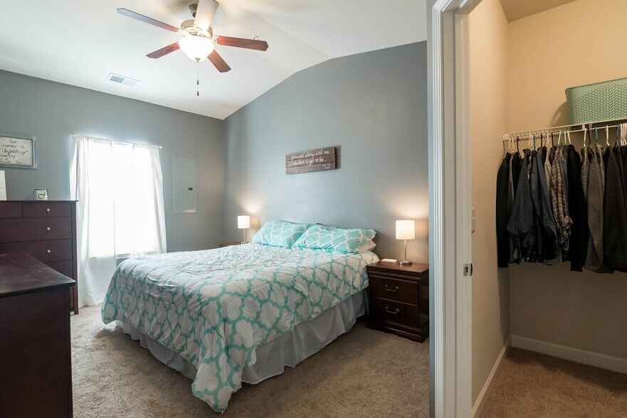 Master bedroom with walk-in closet. - 1040 Charlie Daniels Pkwy