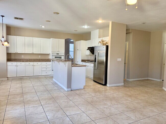 Building Photo - GATED SUMMERLIN HOME | 5 BEDROOM + DOWNSTAIRS DEN | 3-CAR GARAGE