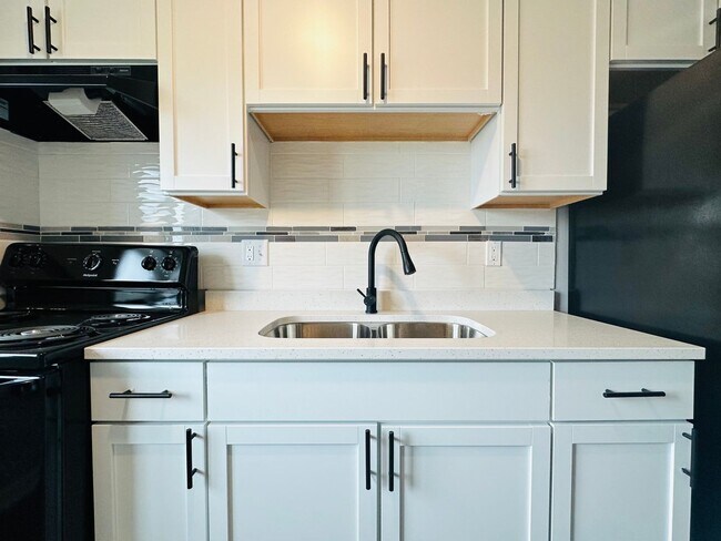 Building Photo - Experience Luxury Living at Park Harrison:...