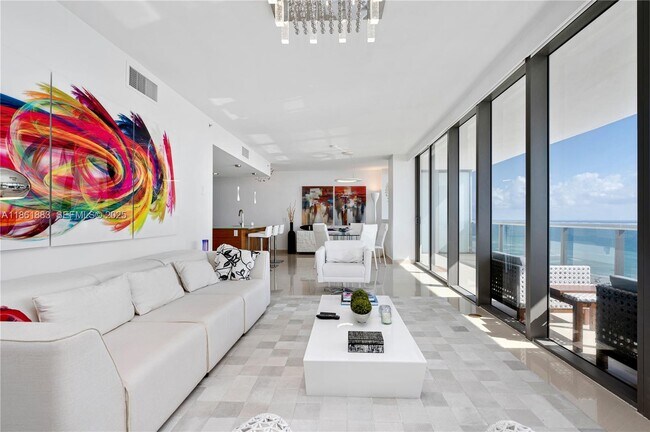 Building Photo - 5875 Collins Ave