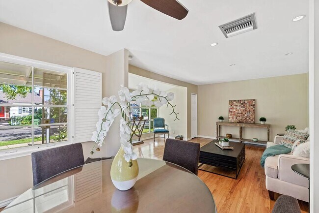 Beautiful living room space with hardwood floors - 14024 Peach Grove St
