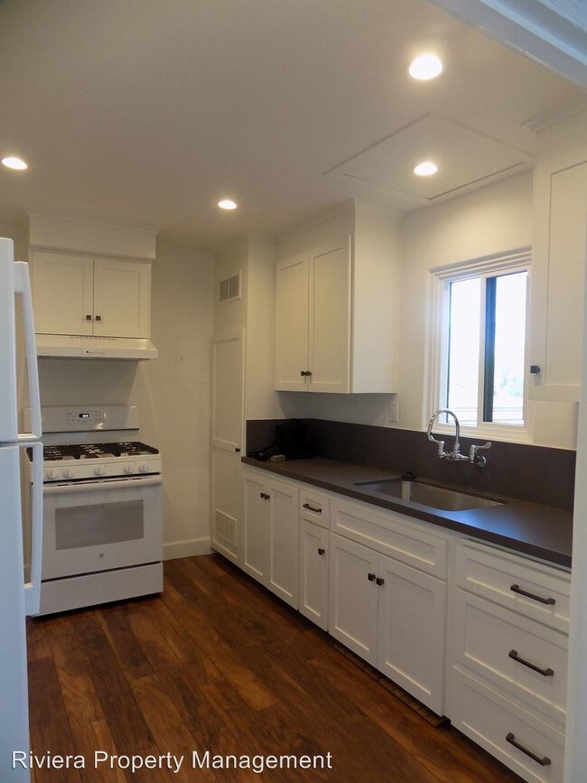 Building Photo - 6675-6677 Electric Ave