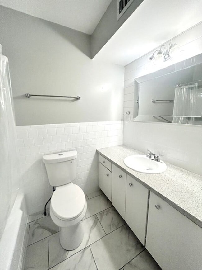 Building Photo - 55+Community - ANNUAL  1/1 GREAT LOCATION - UPDATED UNIT WITH COMMUNITY HEATED POOL!