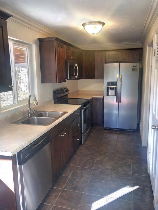 Building Photo - Evolve Real Estate: Victorian Home in Athmar Park Available for Move in on July 1st!