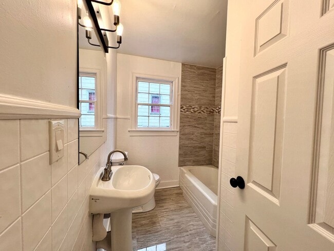 Building Photo - Beautiful Hardwood Floors and More