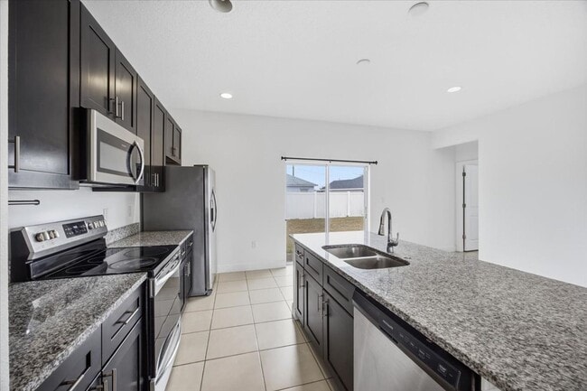 Building Photo - Stunning 4-Bedroom, 2-Bath Home in Poinciana with Modern Upgrades